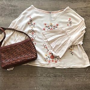 Embroidered pink bell sleeve blouse